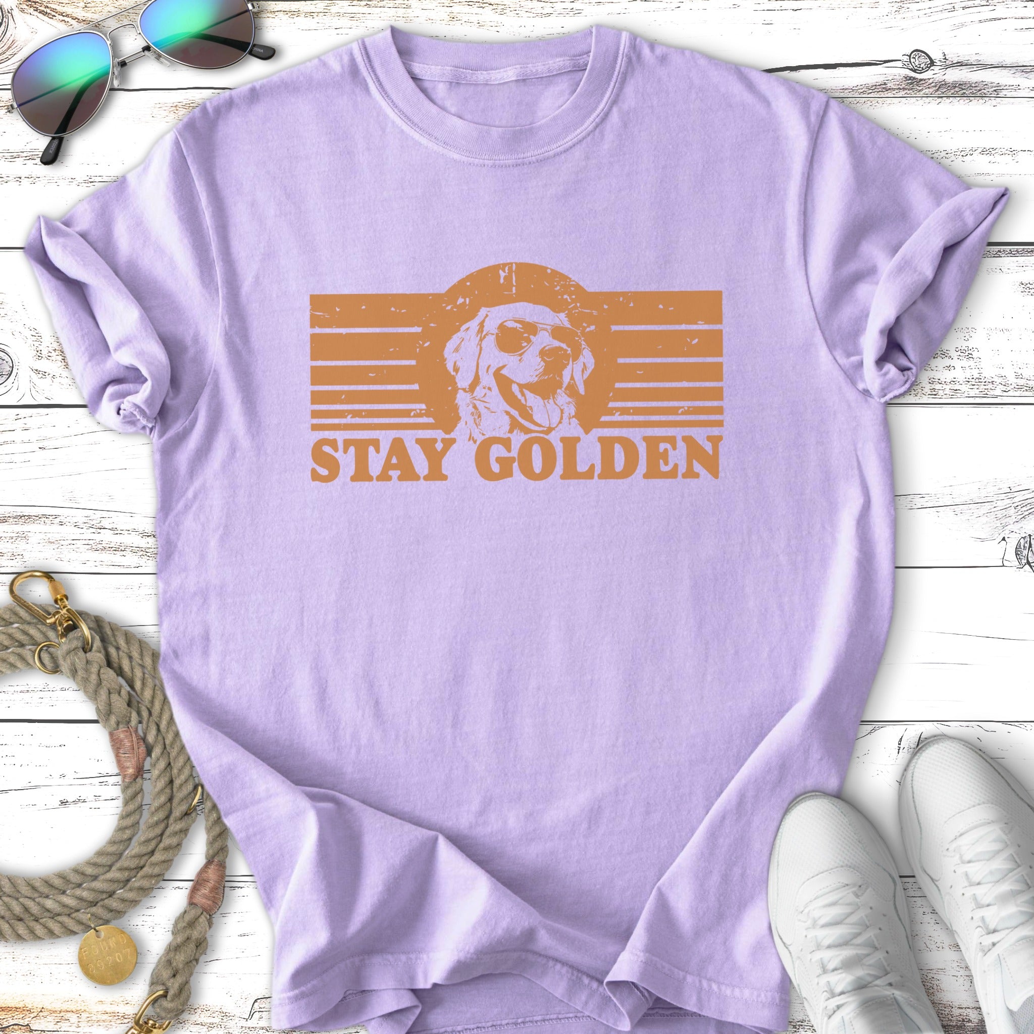 Lavender t-shirt with a distressed golden retriever graphic and "STAY GOLDEN" text.