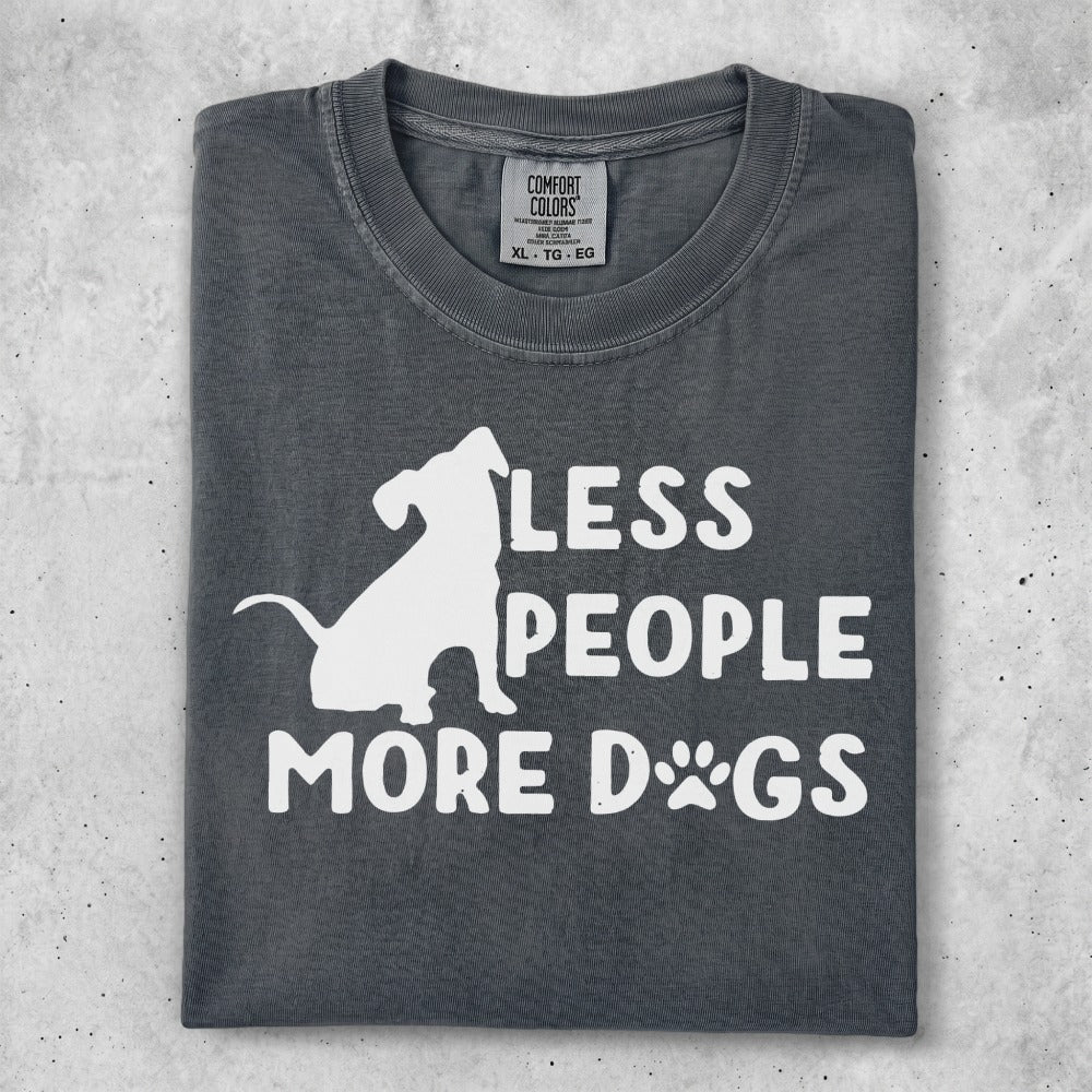 T-shirt with a dog silhouette and text "Less People More Dogs".