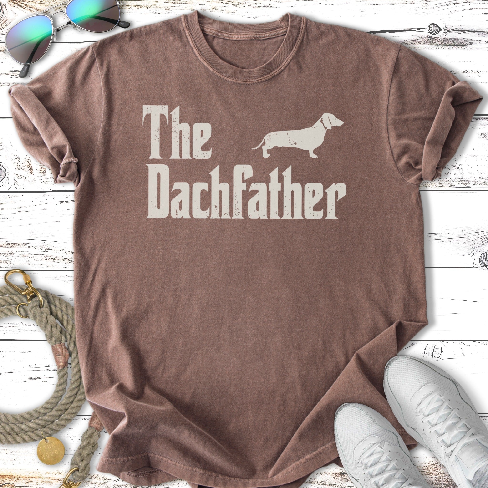 Brown t-shirt with white text "The Dachfather" and a dachshund silhouette.