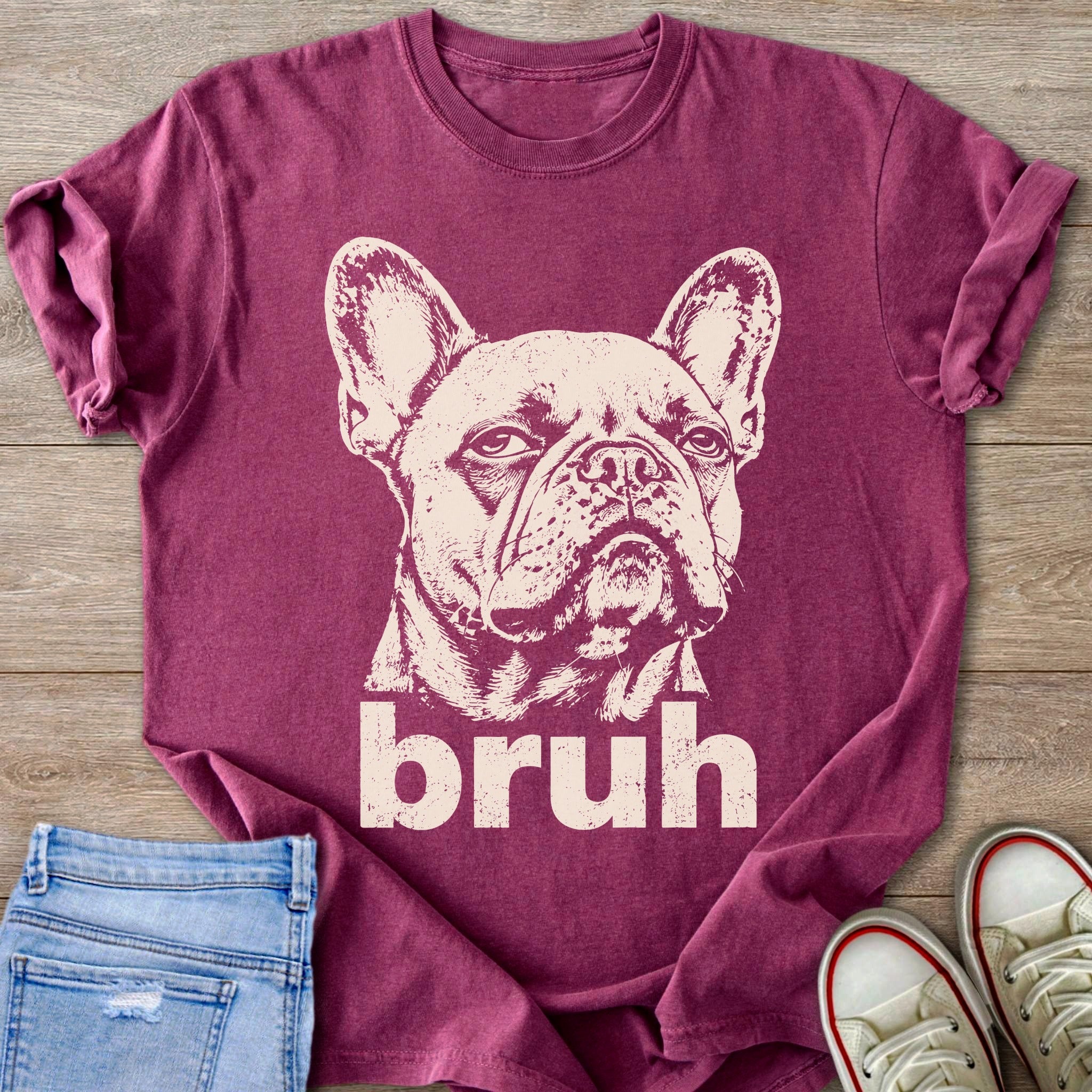 French bulldog graphic with the word "bruh" on a maroon t-shirt.