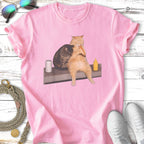 Two cats hug, one holding a hot dog, on a t-shirt.