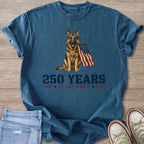 German Shepherd holding American flag with "250 YEARS 1776-2026" text.