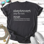 Dark t-shirt with white text defining "sheptrovert" as a German Shepherd lover.
