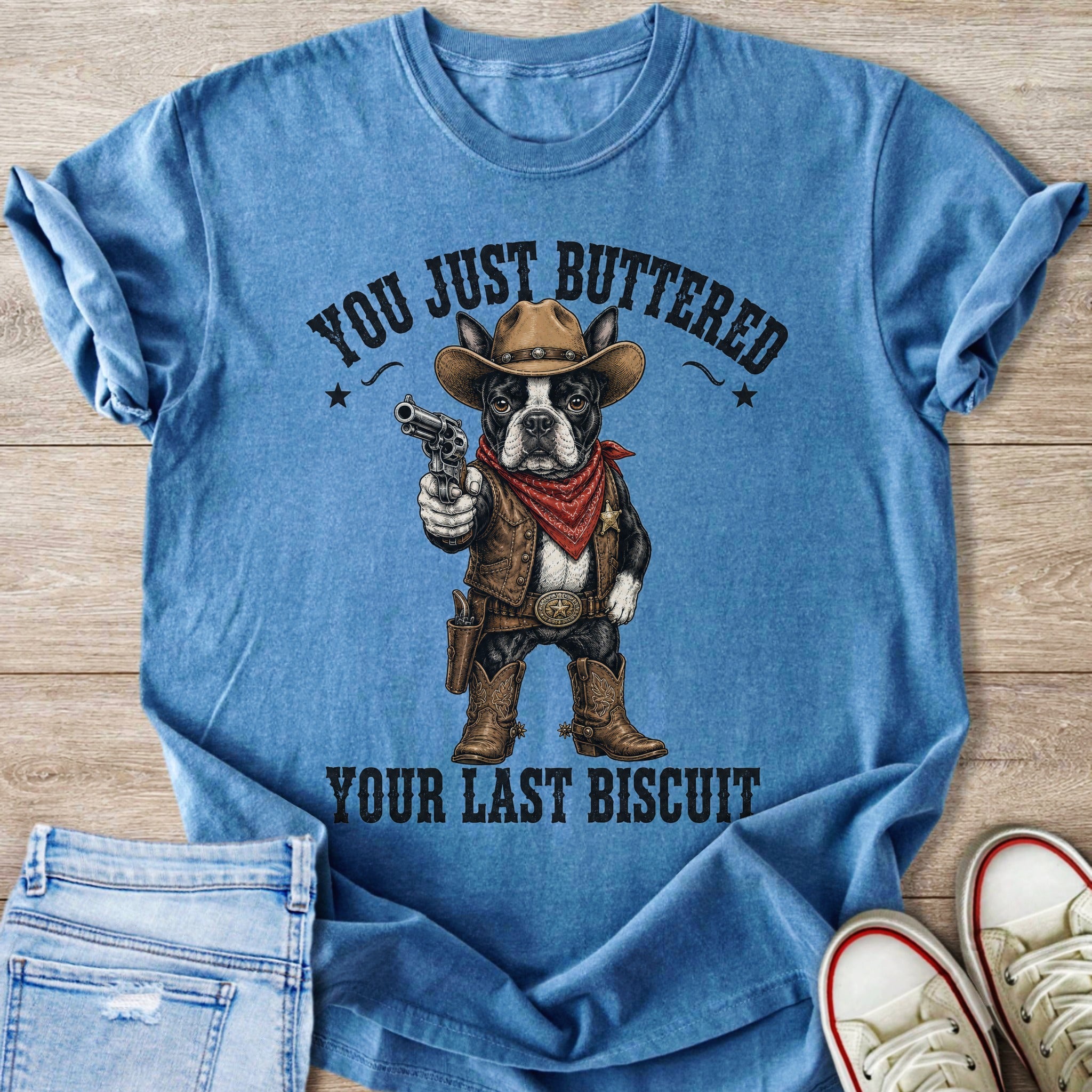 French bulldog cowboy with gun, text says "You Just Buttered Your Last Biscuit."