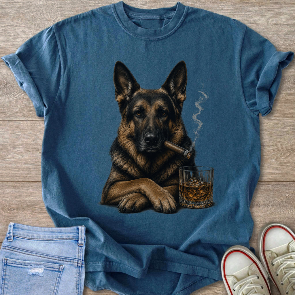 German Shepherd with cigar and whiskey, on a t-shirt with jeans and shoes.