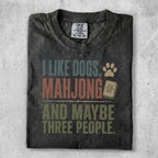 T-shirt with text "I like dogs, mahjong and maybe three people."