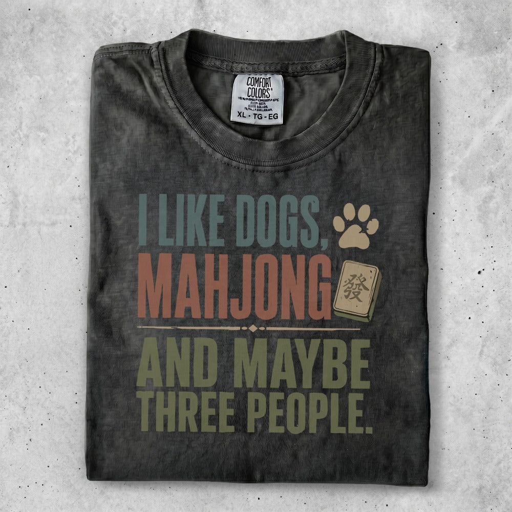 T-shirt with text "I like dogs, mahjong and maybe three people."