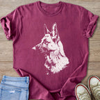 Maroon t-shirt with white German Shepherd graphic, paired with jeans and sneakers.