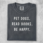 Comfort Colors t-shirt with "PET DOGS. READ BOOKS. BE HAPPY." text.