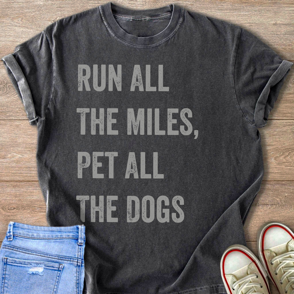 Dark grey t-shirt with distressed text "RUN ALL THE MILES, PET ALL THE DOGS".