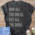 Dark grey t-shirt with distressed text "RUN ALL THE MILES, PET ALL THE DOGS".