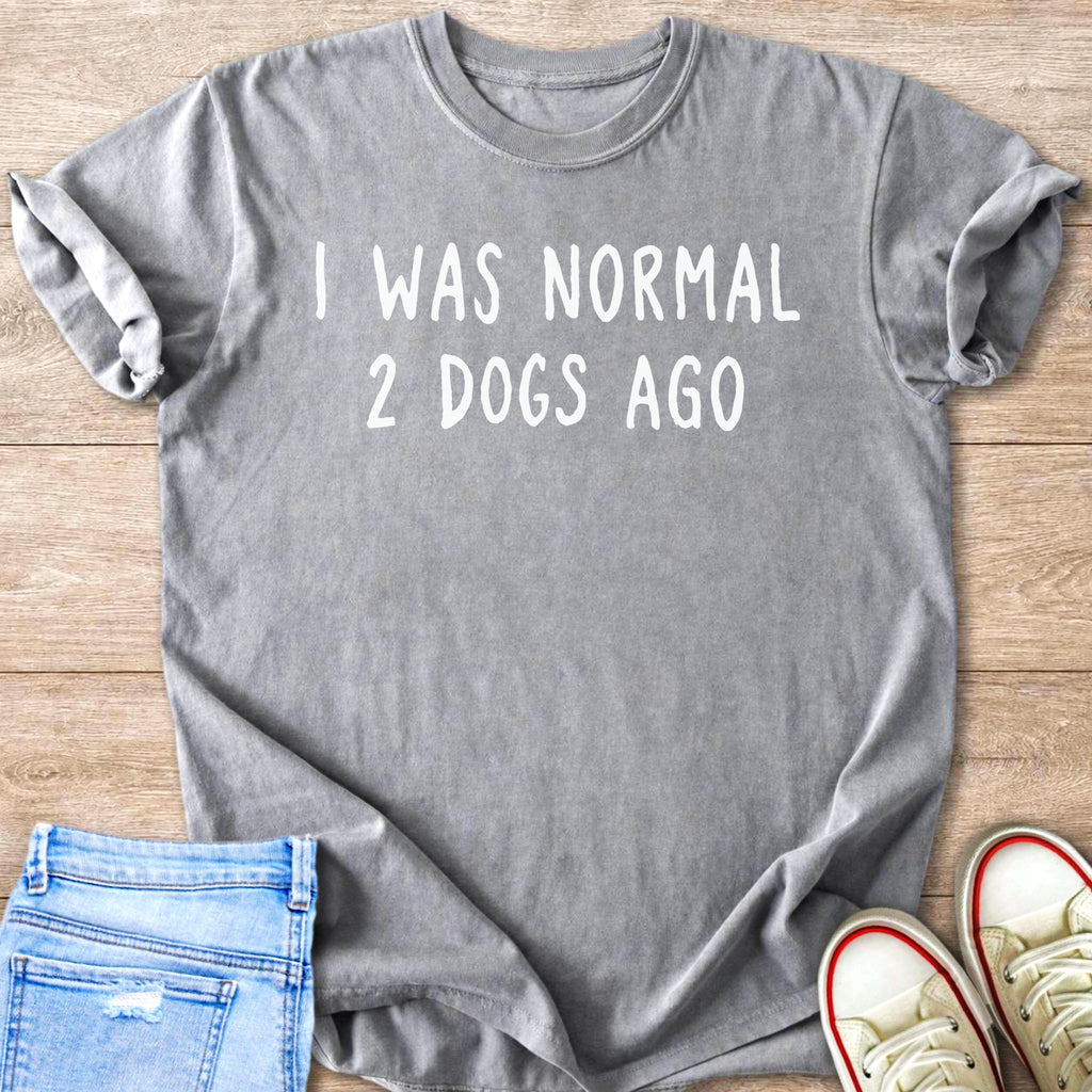 Gray t-shirt with white text "I WAS NORMAL 2 DOGS AGO".
