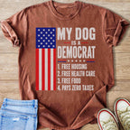 T-shirt with American flag and text "My dog is a democrat" with four listed points.