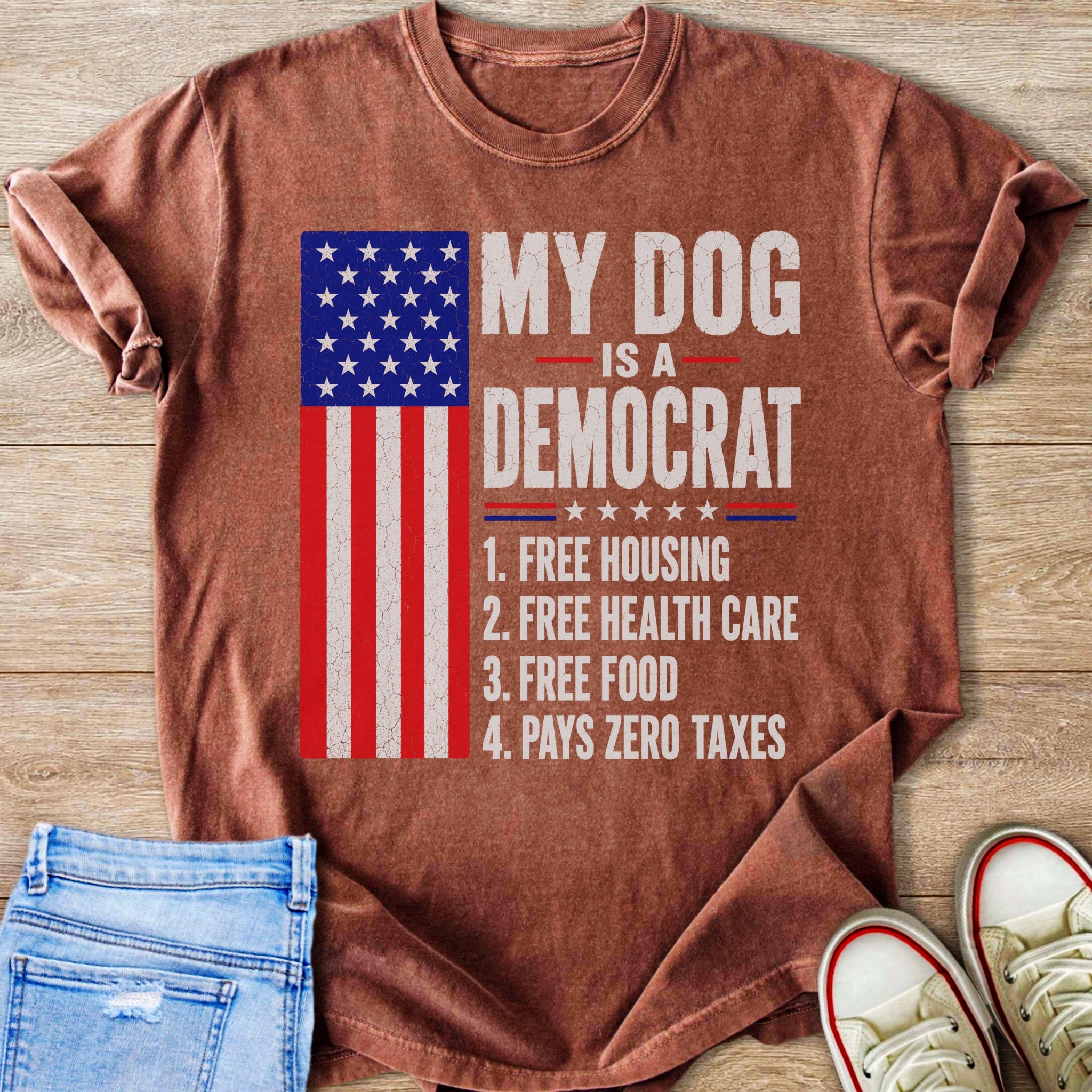 T-shirt with American flag and text "My dog is a democrat" with four listed points.