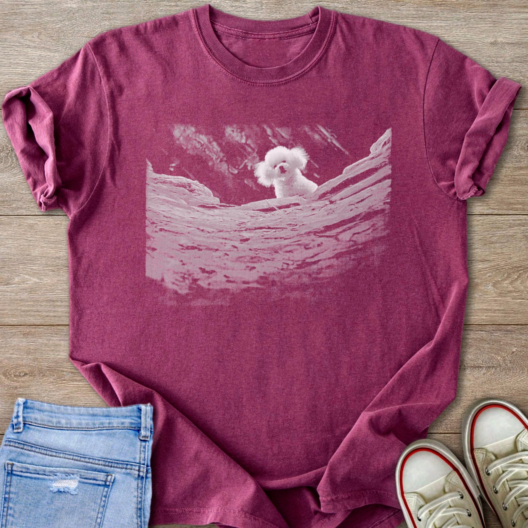 Berry Comfort colors 1717 T-shirt with a white Bichon Frise dog precious from silence of the lambs graphic, the dog is peeking from rock well. 