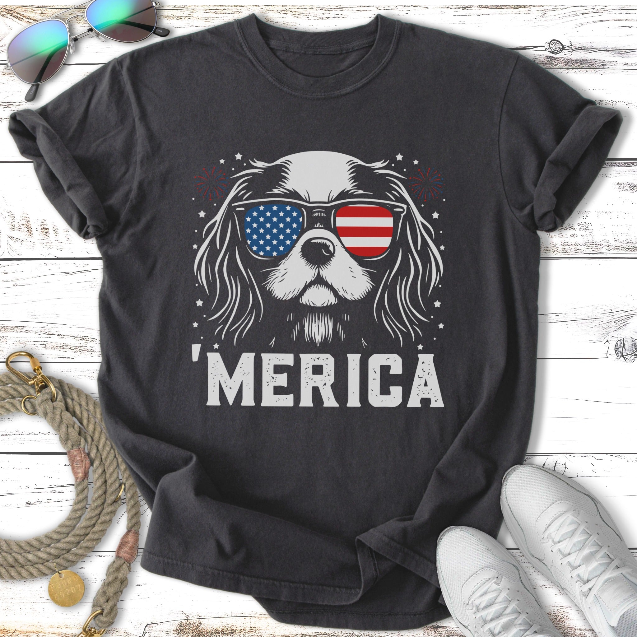 Dog wearing sunglasses with American flag design and 'MERICA text.