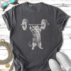 Cat lifting barbell, charcoal t-shirt.
