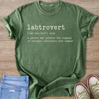 Green t-shirt with "labtrovert noun: a person who prefers the company of labrador retrievers over humans" printed in white text.