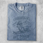 Dachshund in sunglasses and hat skiing, with "Hot Doggin' Ski Resort" text.