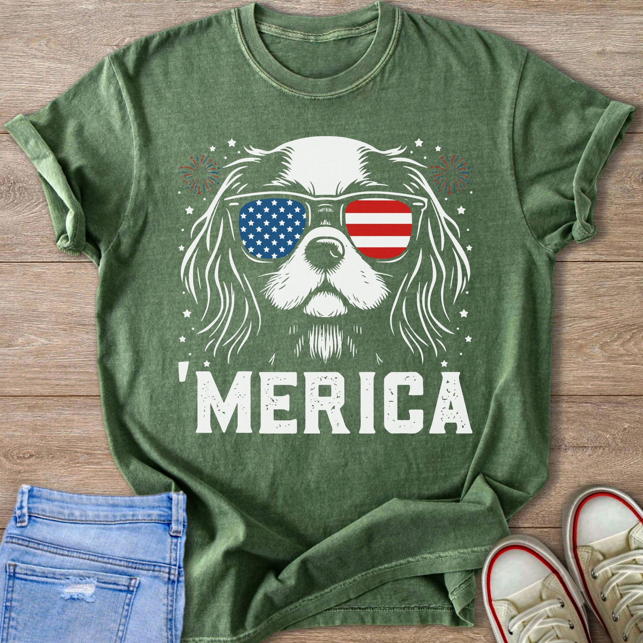 Dog wearing American flag sunglasses with 'MERICA text and fireworks.