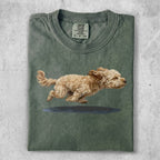 T-shirt with a brown dog running over a puddle.
