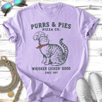 T-shirt graphic of a cat chef with "Purrs & Pies Pizza Co." text.