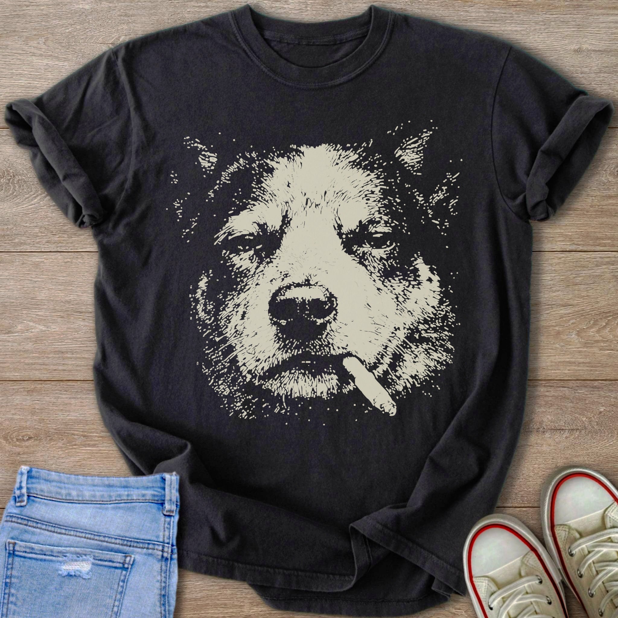 Black t-shirt with a light-colored illustration of a dog's face holding a cigar.