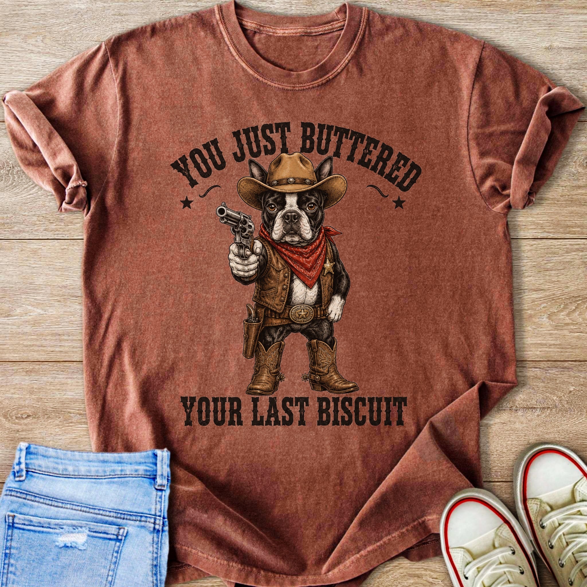 Boston terrier in cowboy attire holding a gun with text "You just buttered your last biscuit".