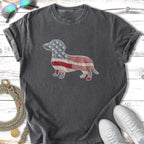 Dark t-shirt with patriotic dachshund patch, sunglasses, and sneakers.