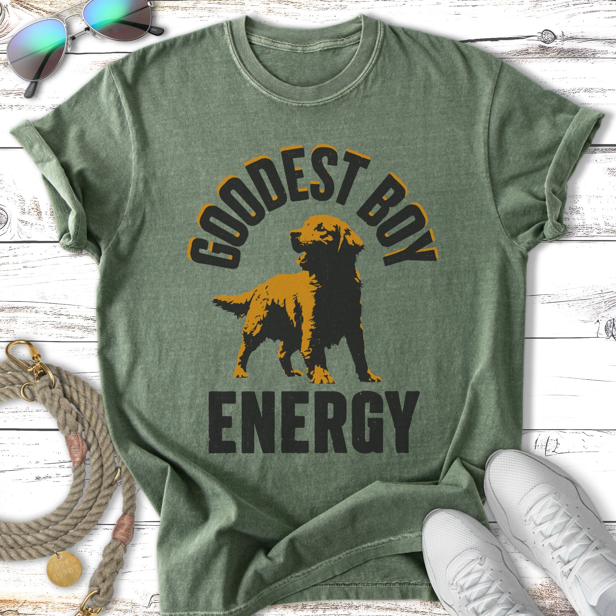 Green t-shirt with "GOODEST BOY ENERGY" and a golden retriever graphic.