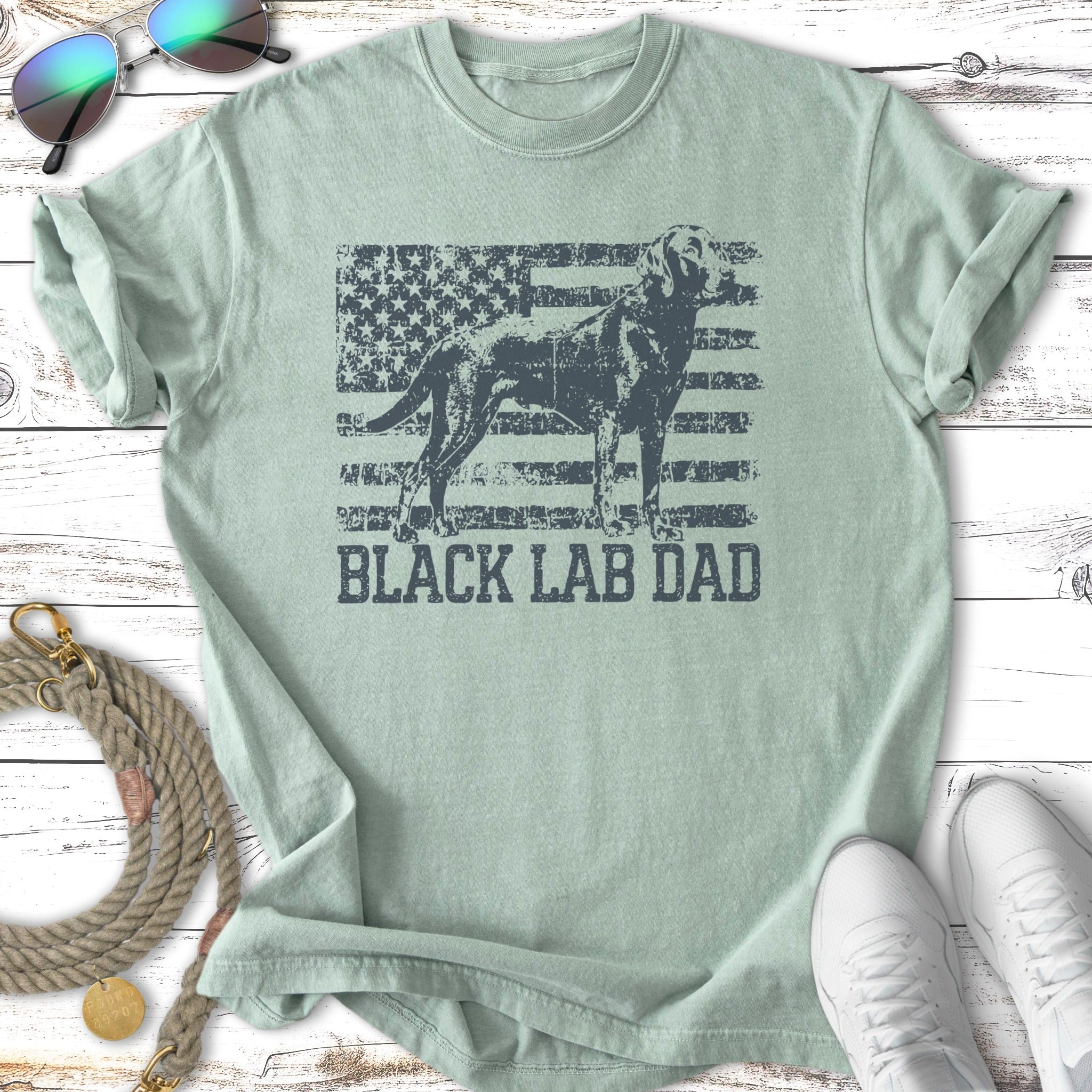 Light green t-shirt with distressed black lab silhouette and American flag on the chest.
