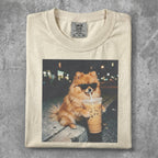 Pomeranian wearing sunglasses drinks iced coffee.