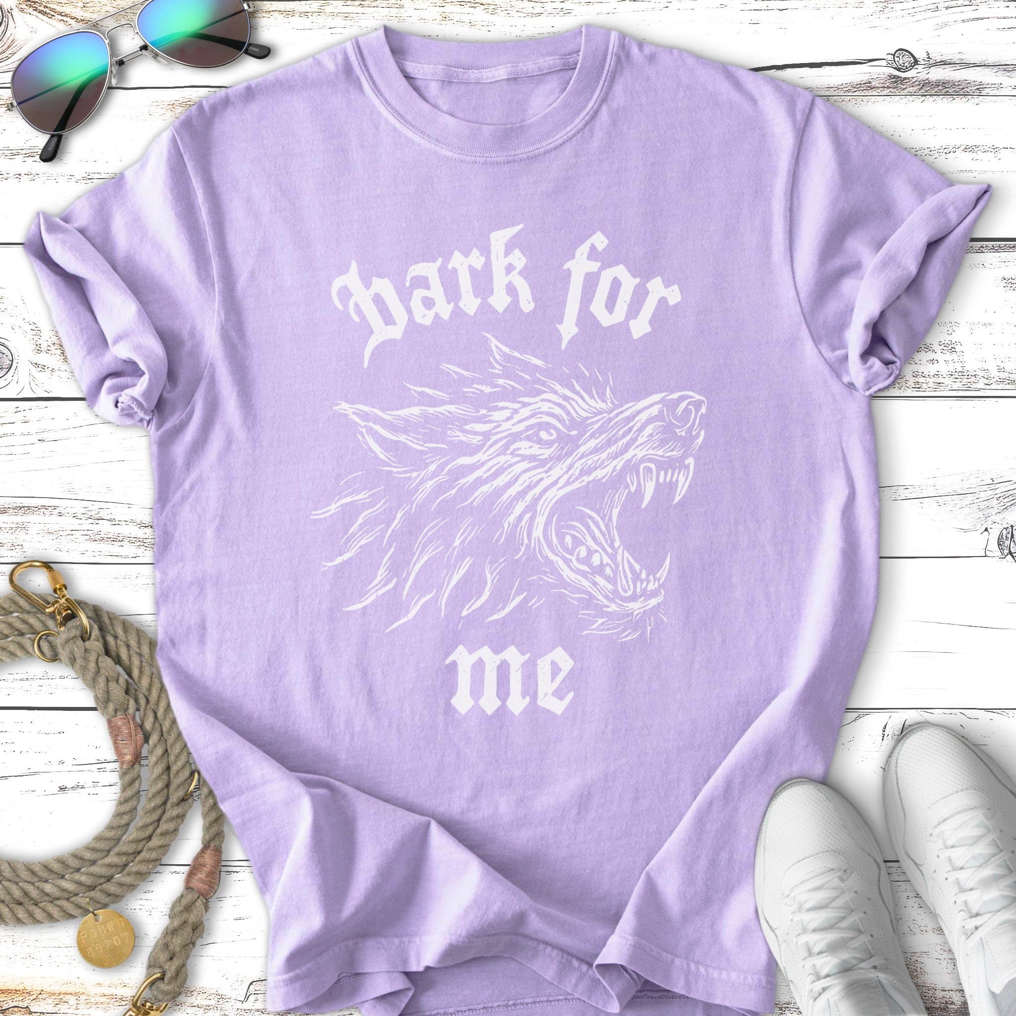 Purple t-shirt with white wolf head graphic and "bark for me" text.