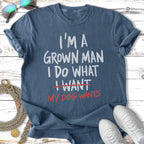 Blue t-shirt with "I'm a grown man, I do what I want" and "my dog wants" text.