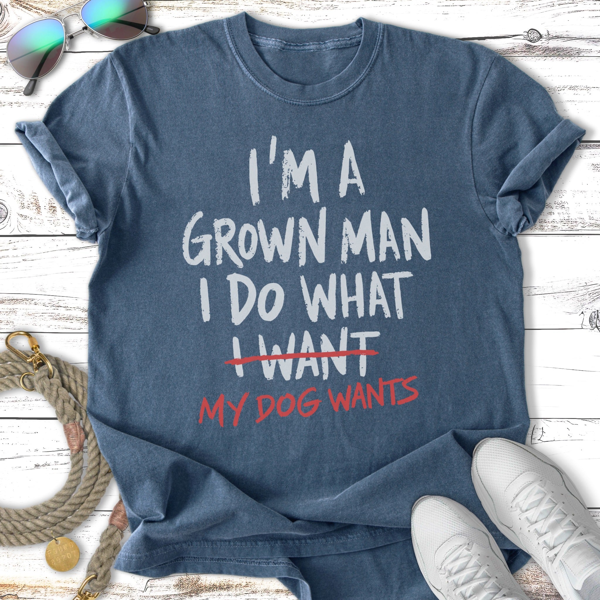 Blue t-shirt with "I'm a grown man, I do what I want" and "my dog wants" text.