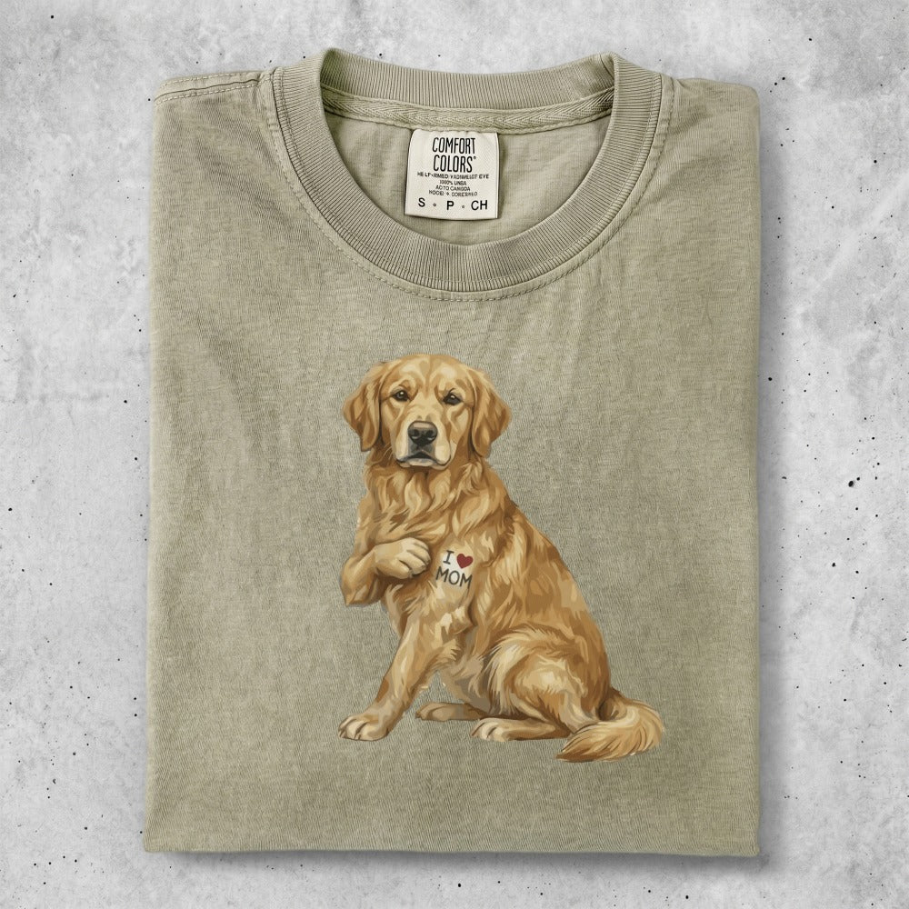 Golden retriever with heart-shaped "I love Mom" tattoo on chest.