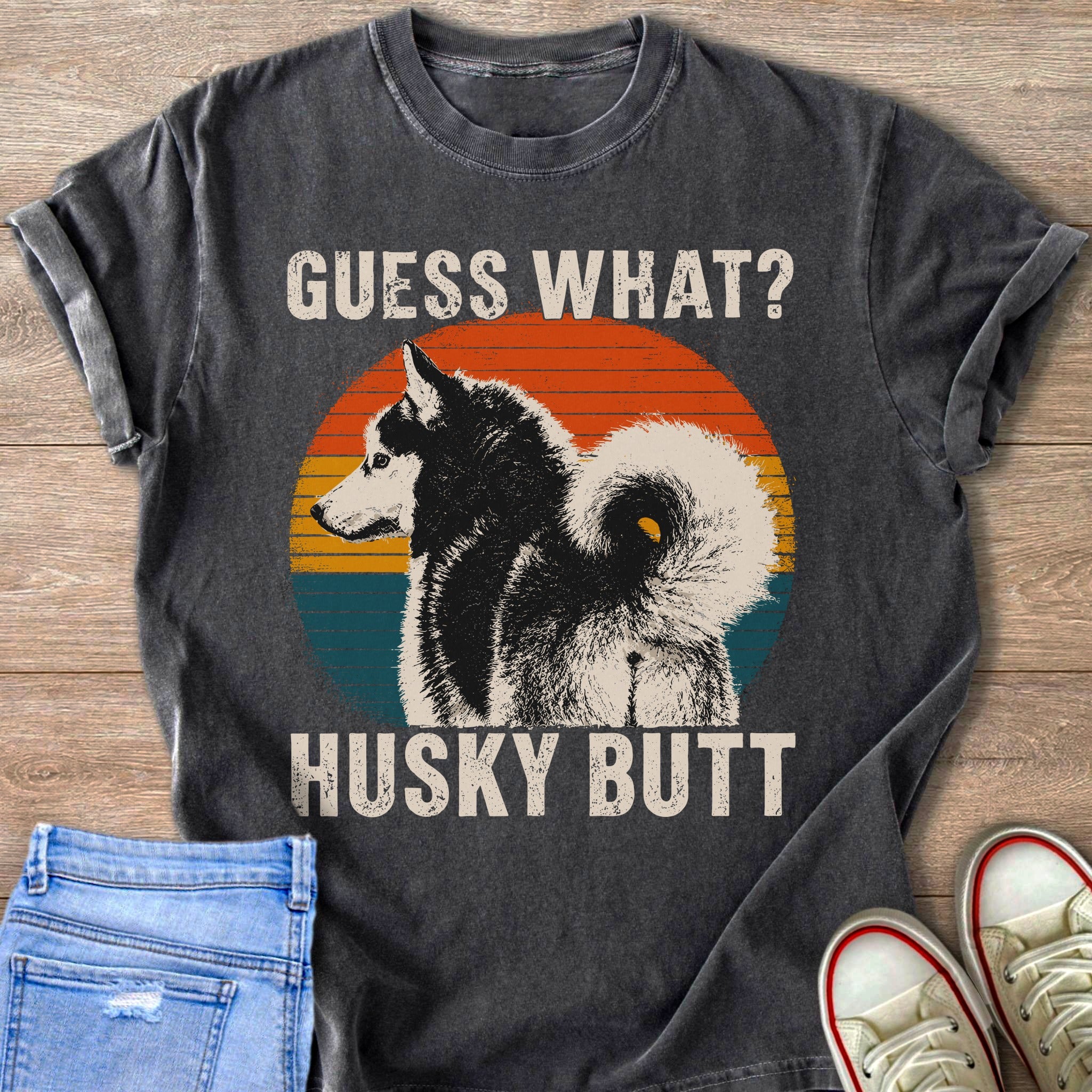 "Guess What? Husky Butt" graphic t-shirt with a vintage sunset circle.