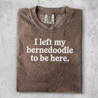 Brown t-shirt with text "I left my bernedoodle to be here."