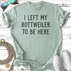 Light mint t-shirt with "I LEFT MY ROTTWEILER TO BE HERE" text.