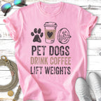 Pink t-shirt with "PET DOGS DRINK COFFEE LIFT WEIGHTS" text and graphics.
