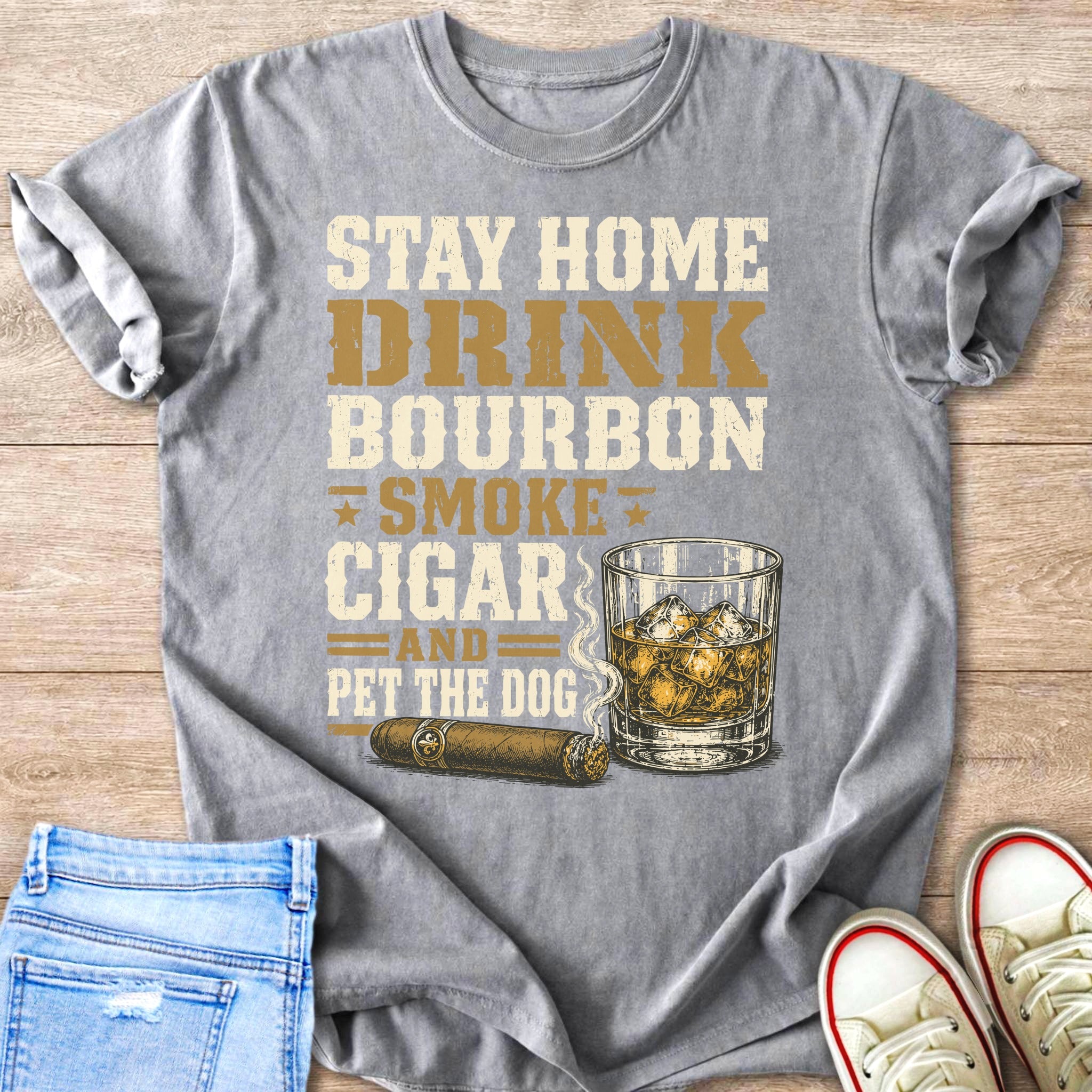 T-shirt with "Stay Home Drink Bourbon Smoke Cigar And Pet The Dog" text and whiskey glass.