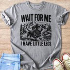 Gray t-shirt with dachshund and mountains graphic, reads "WAIT FOR ME I HAVE LITTLE LEGS".