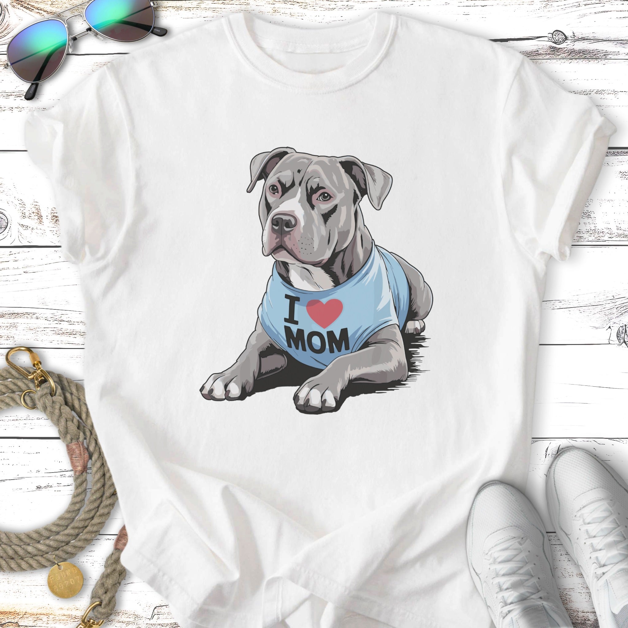 White t-shirt with graphic of a pit bull wearing an "I Love Mom" shirt.