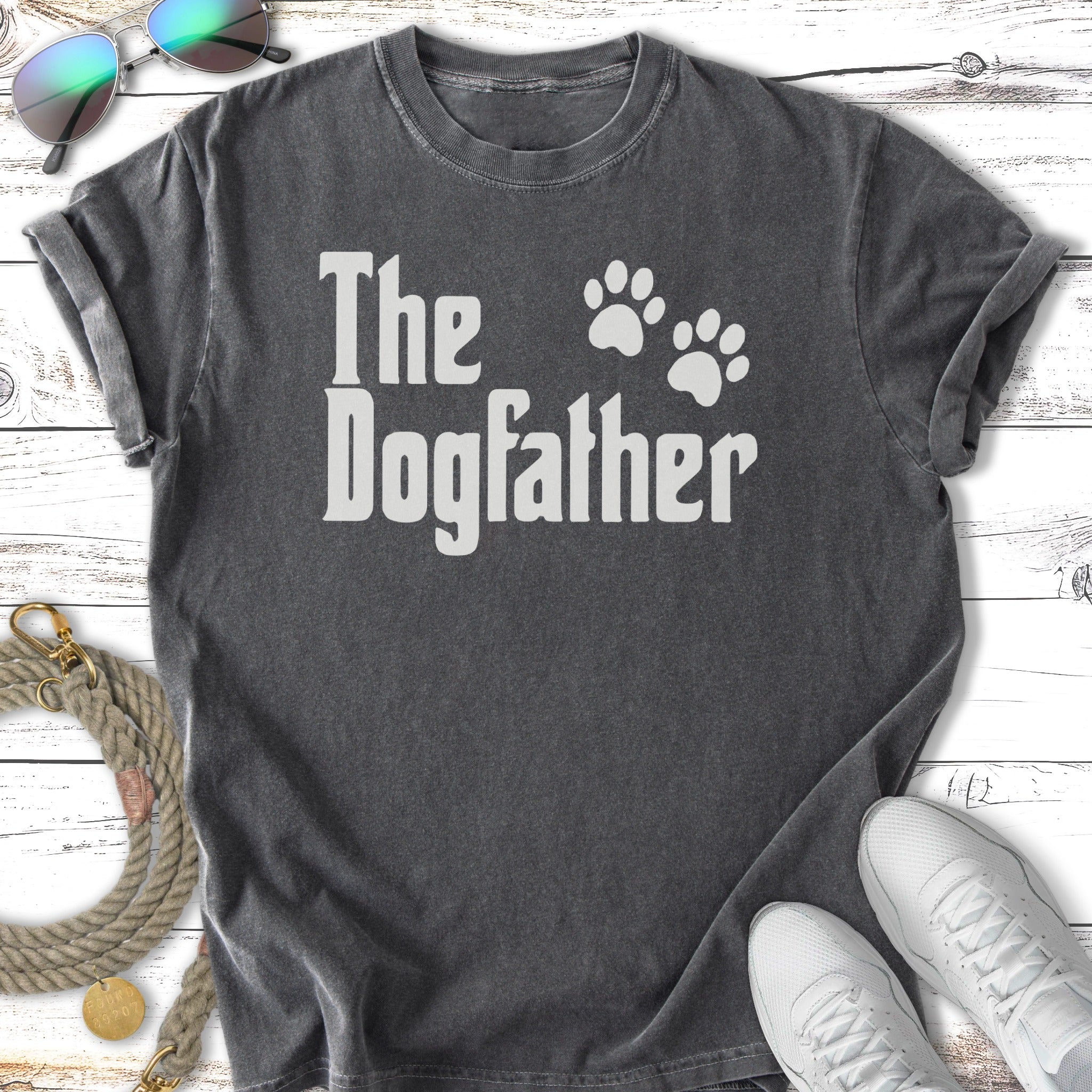 Dark gray t-shirt with white text "The Dogfather" and two paw prints.