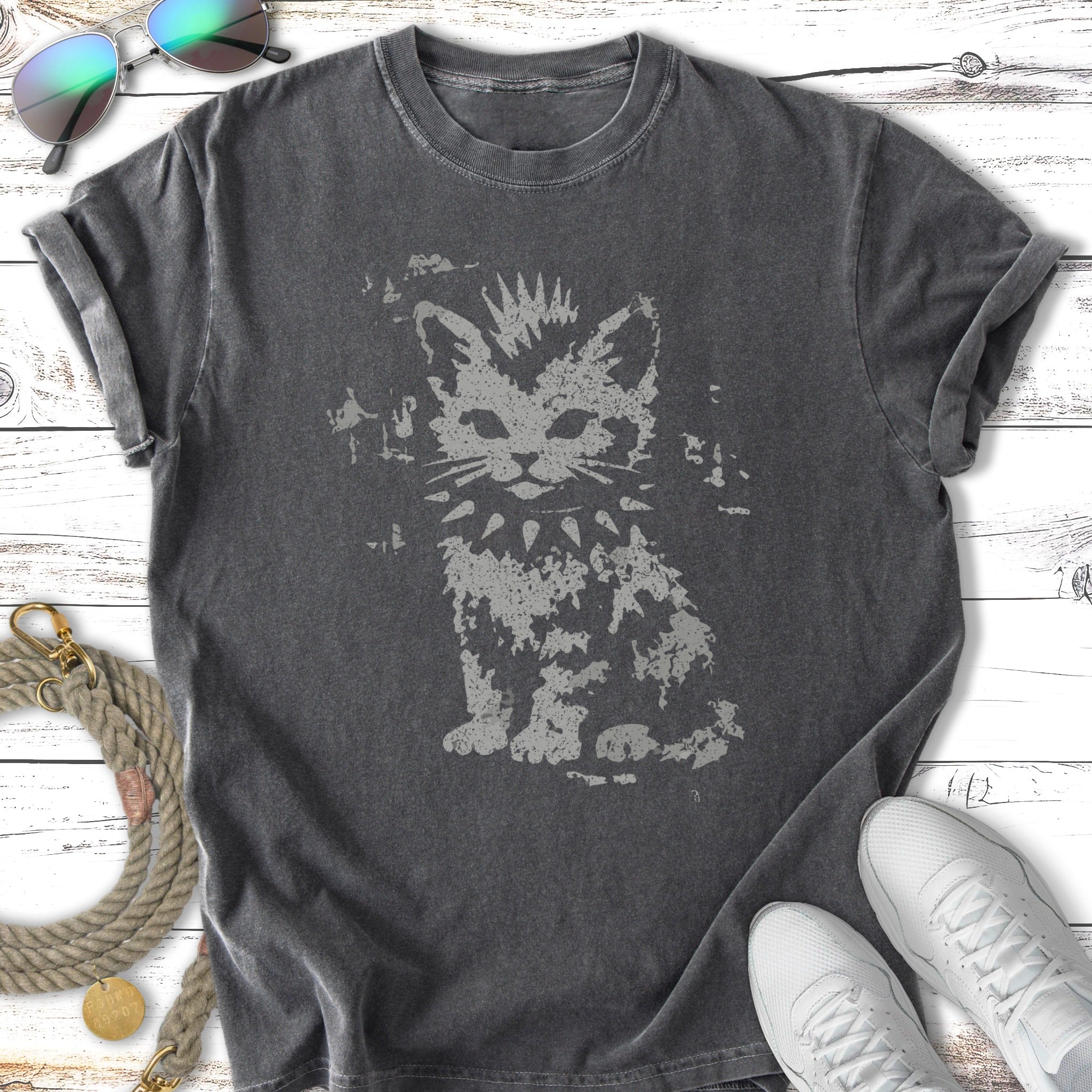 Dark t-shirt with distressed graphic of a punk kitten with spiked collar.