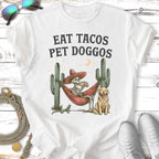 Skeleton in hammock eating tacos, dog, cacti, and lizard.