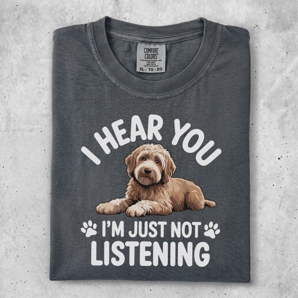 Charcoal t-shirt with a doodle dog graphic and "I hear you, I'm just not listening." text.