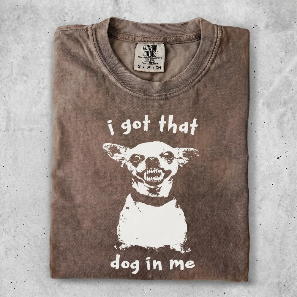 Brown t-shirt with white graphic of snarling dog and text "i got that dog in me".