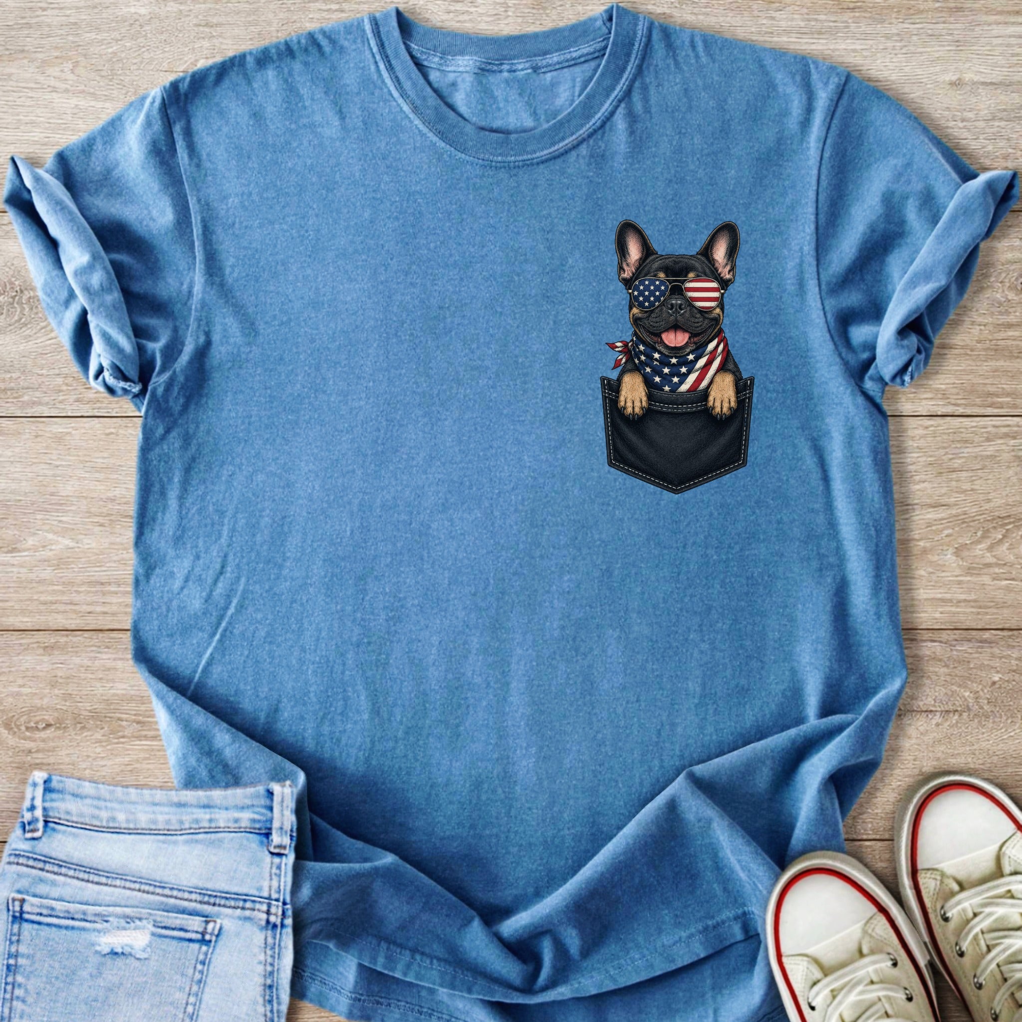 French bulldog wearing sunglasses and bandana peeking from a chest pocket illustration.