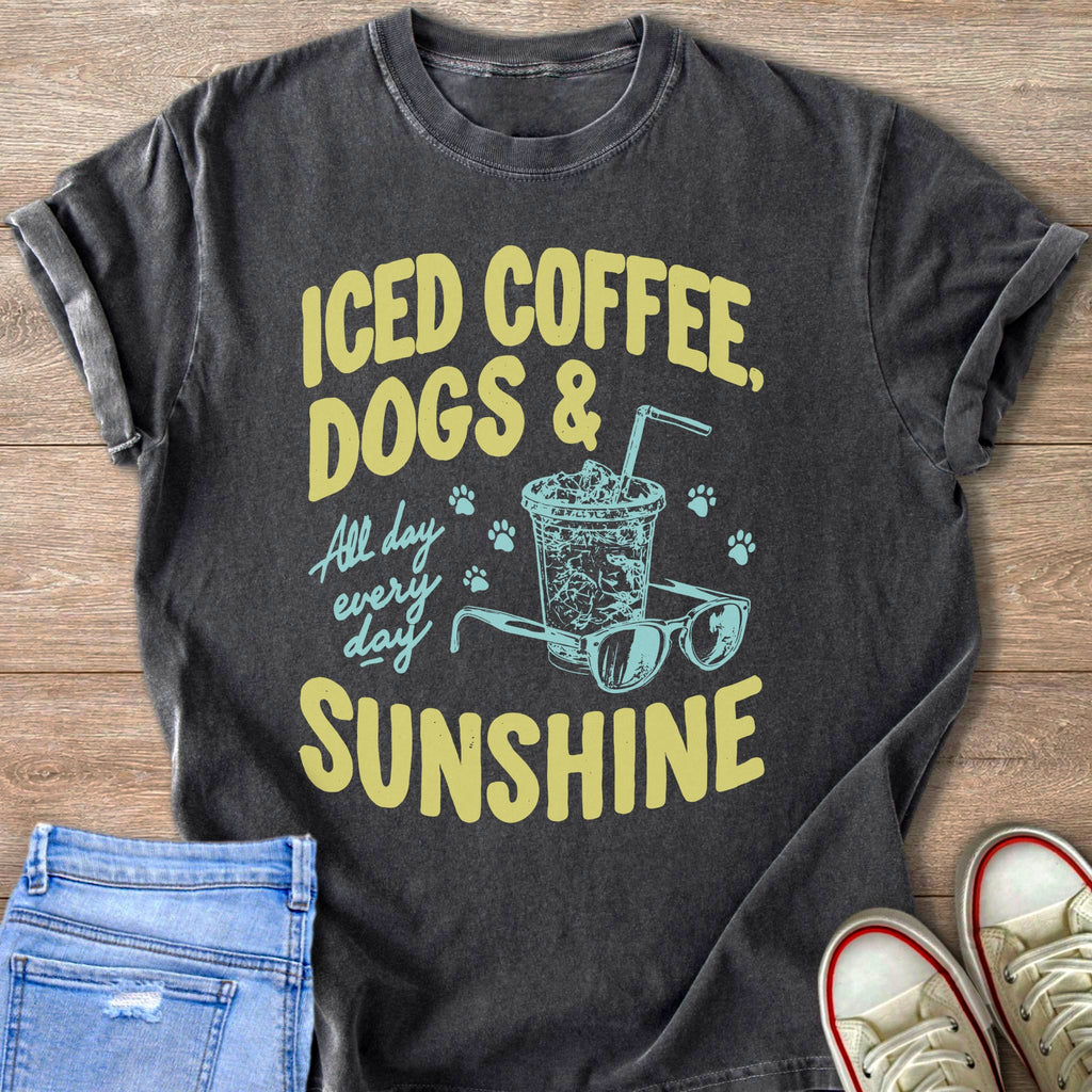 T-shirt with "Iced coffee, dogs & sunshine" text, iced drink, glasses, and paw prints.